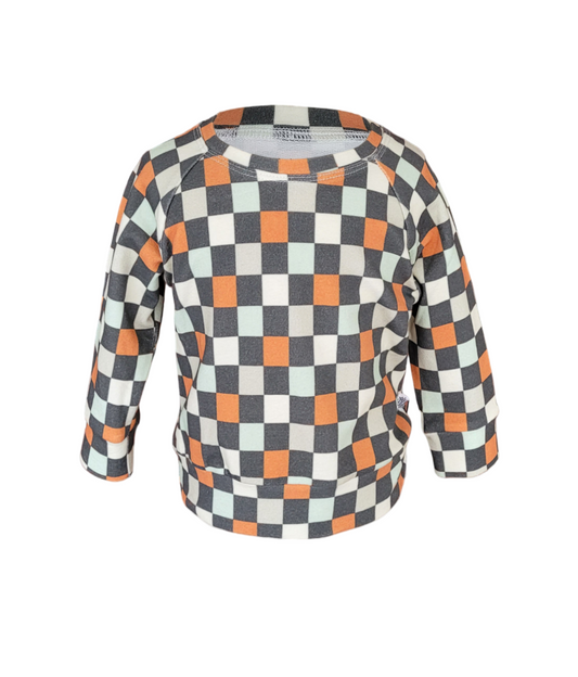 Front of Autumn Sweatshirt. Organic Black, orange, olive and cream checkered sweatshirt.