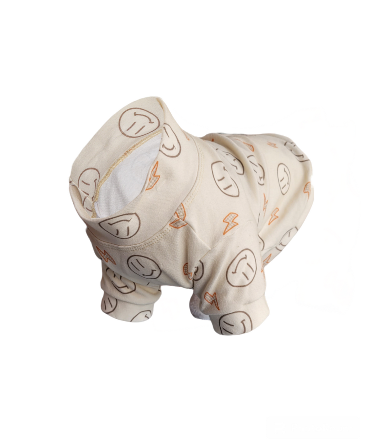 Organic Dog Sweater. Cream dog sweater with orange lighting bolts and smiley face outlines