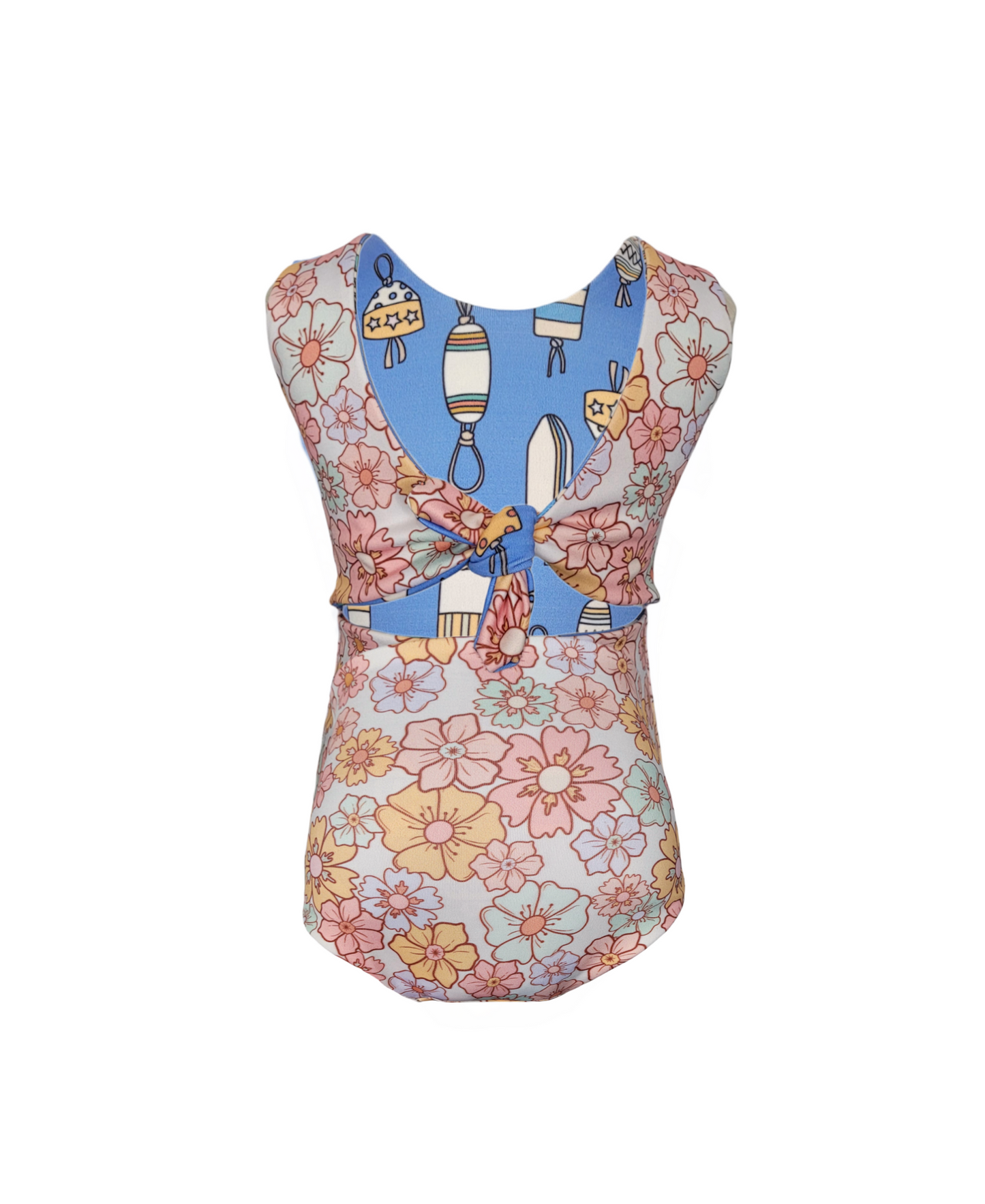Girls reversible swimsuit. Light pink with pastel flowers.