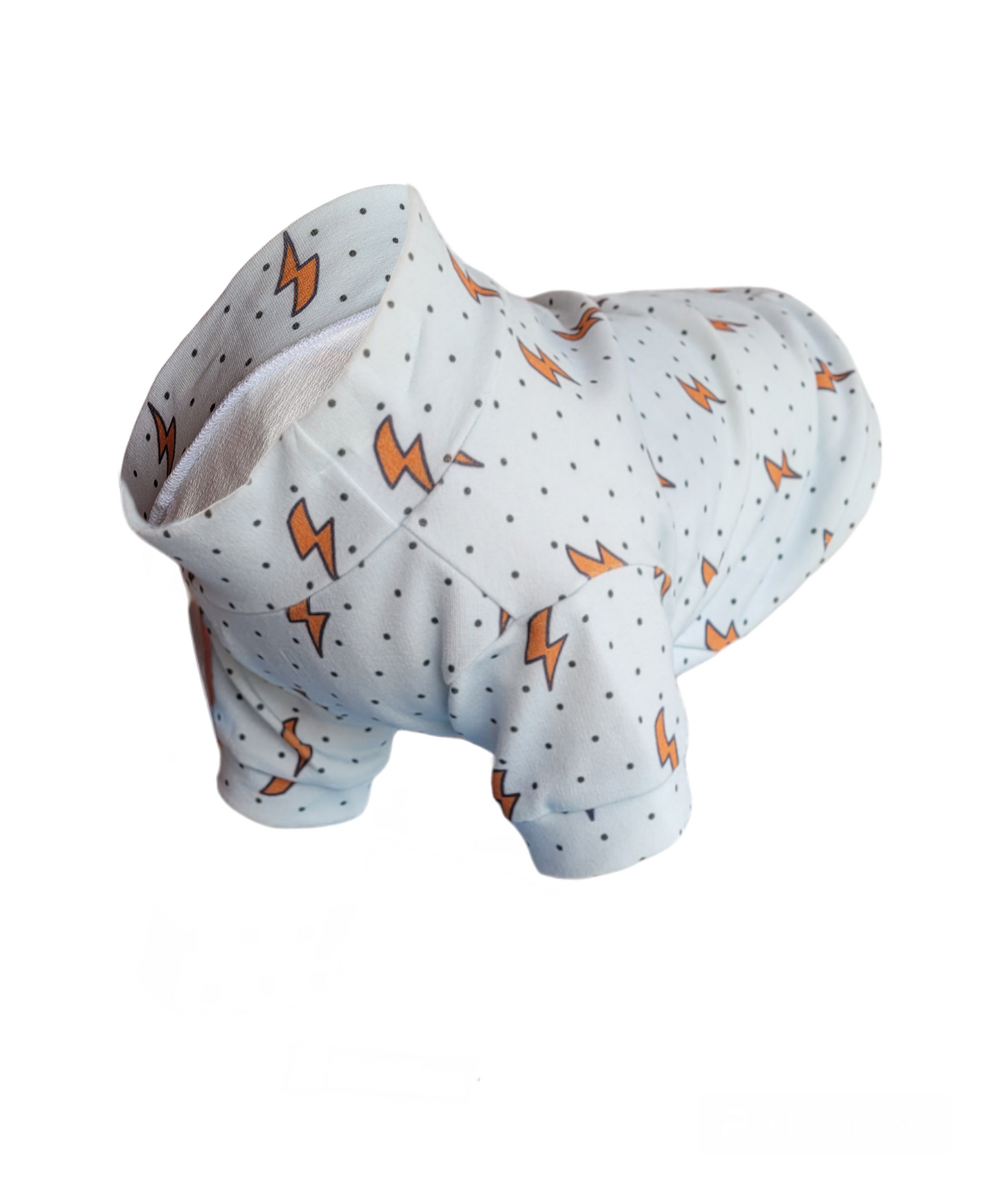 Light blue dog sweater with orange lightening bolts
