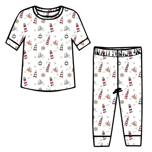 Nautical Pajama Set. White tee shirt and pant sent with lighthouses, boats and anchors. 