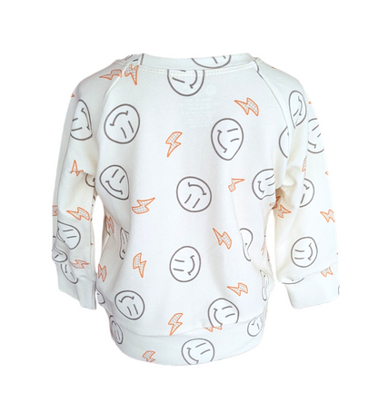 Back of Smiley Sweatshirt. Organic Cream sweatshirt with orange lightening bolts and outlined smiley faces.