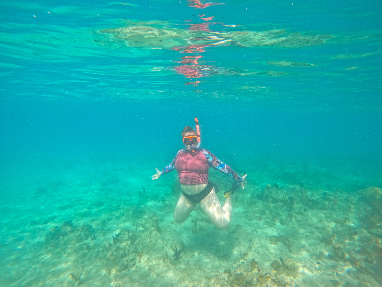 Owner of rolling coast threads, Kelsey, snorkeling in the U.S. Virgin Island waters.