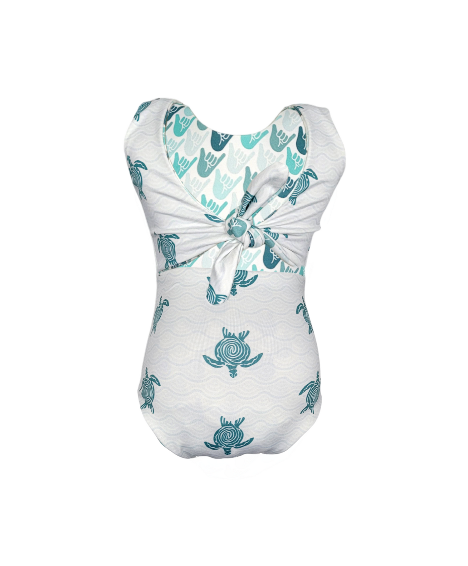 Girls reversible swimsuit. White with teal turtles. 