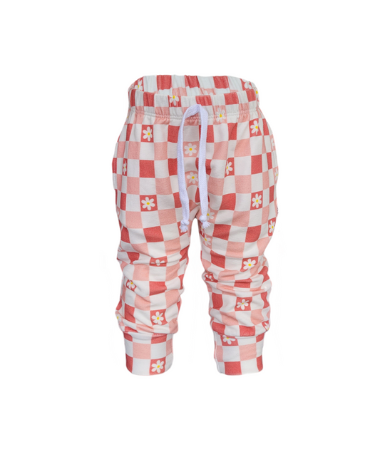 Kids organic cotton sweatpants with red and white checkered pattern and daisy flower print – drawstring waist and cuffed ankles