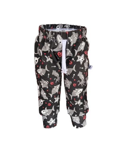 Kids sweatpants with spooky skeleton fish and sea creatures print on black background – handmade from soft cotton with white drawstring